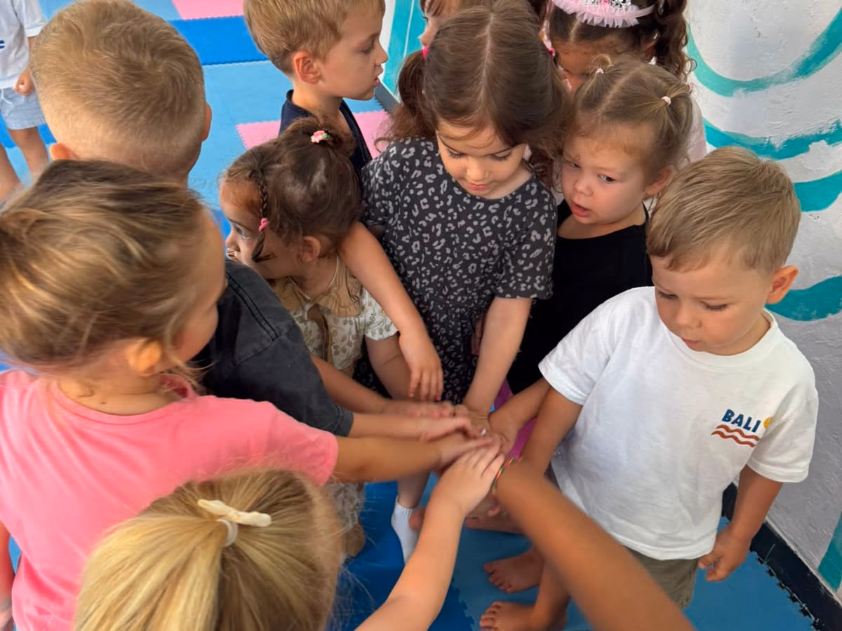 Hands in for the morning circle